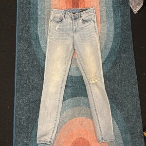 Women's Light Blue Distressed Jeans